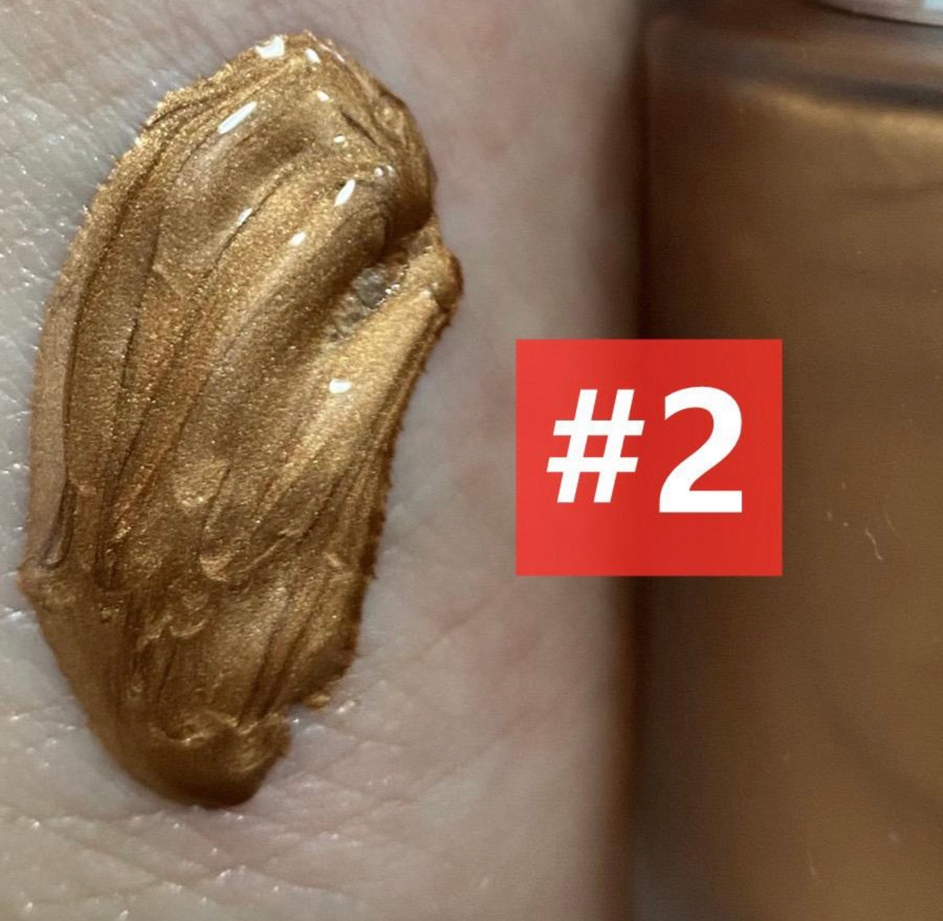 EpiLynx Sunkissed glow drops held in hand