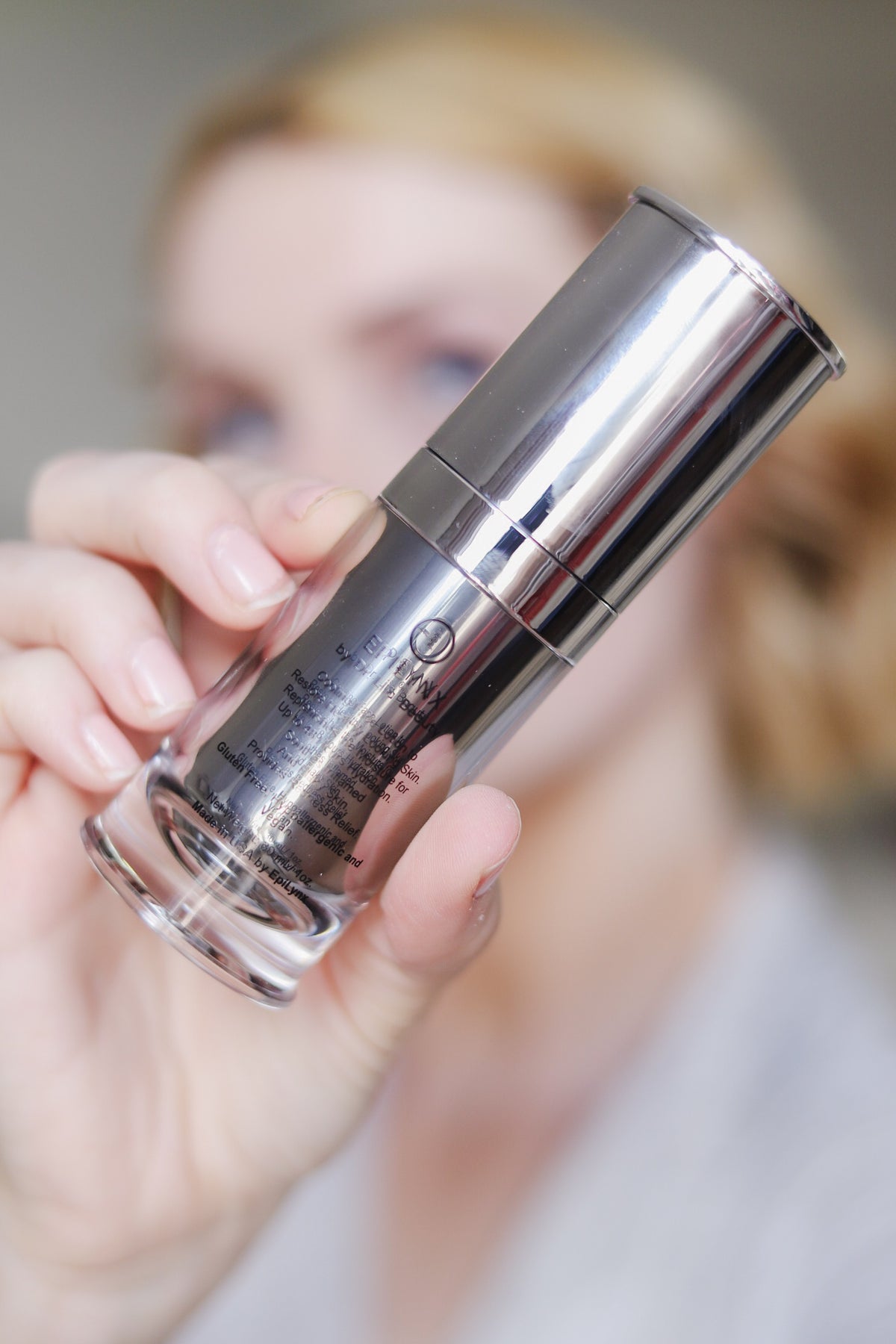 Close-up of the EpiLynx Episilk Crystal gluten-free vegan face serum in its chrome pump bottle