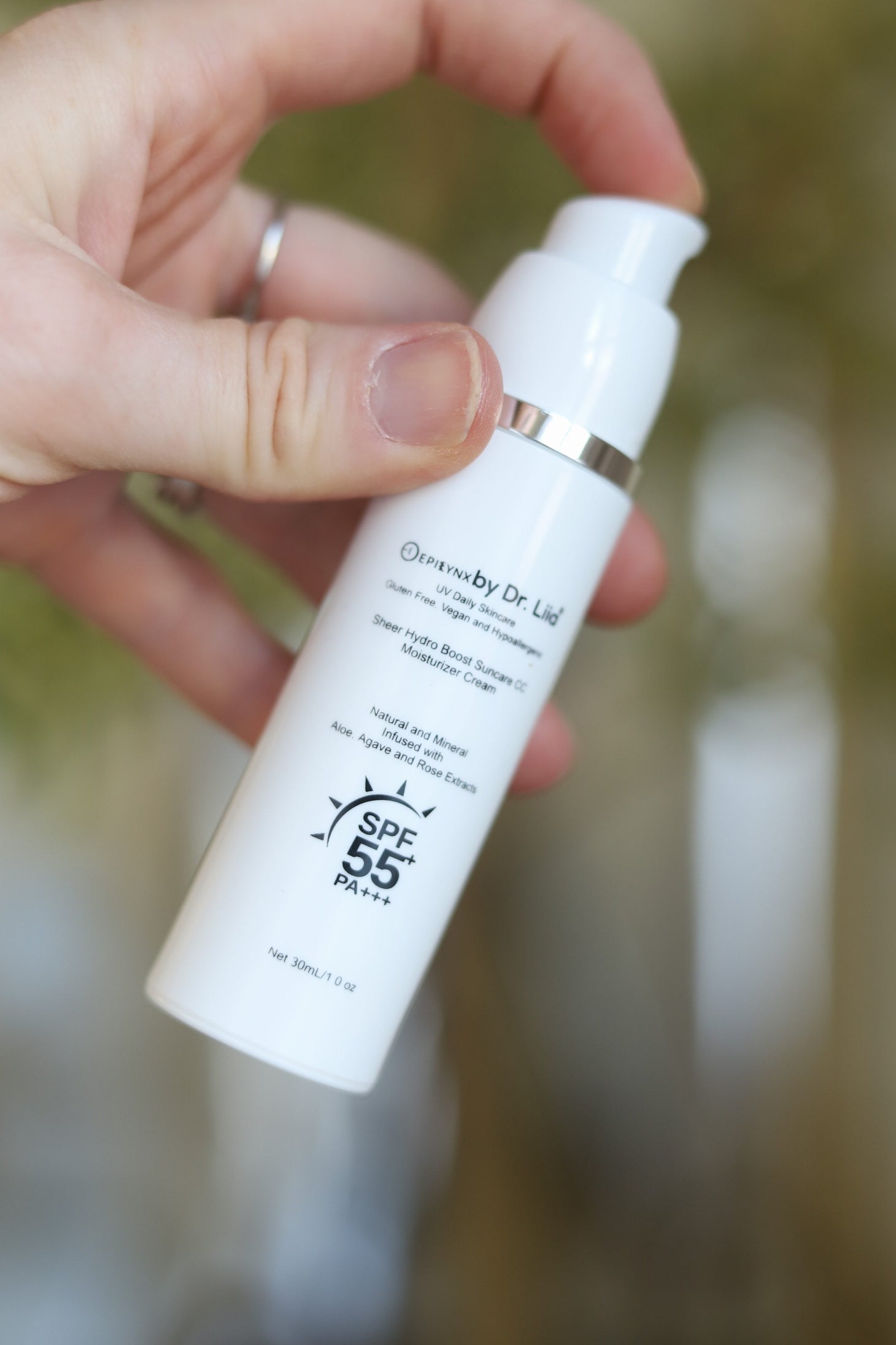 EpiLynx gluten-free vegan mineral SPF 50 moisturizer for sensitive skin held in hand